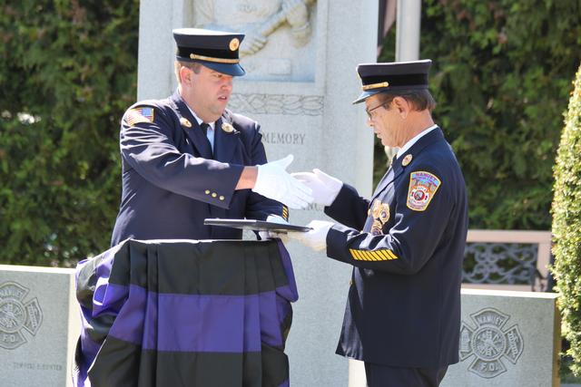 Years of service award given to Socky Trojahn. 50 years.

Memorial Service NFD. September 9, 2012. Photo by Vincent P. Tuzzolino